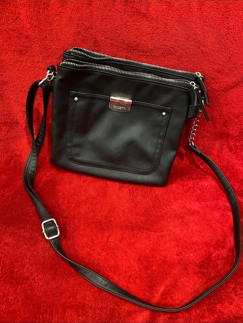 Rosetti Black Crossbody Bag with Front Patch Pocket and Silver Hardware